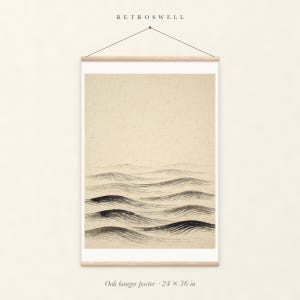 Layered Waves Ink Style oak hanger poster, 24 by 36 inches, with natural wood rails and a hanging cord.