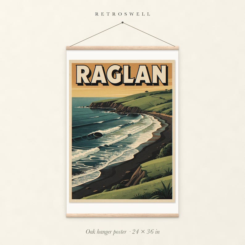 Raglan New Zealand Surf oak hanger poster, 24 by 36 inches, with natural wood rails and a hanging cord.
