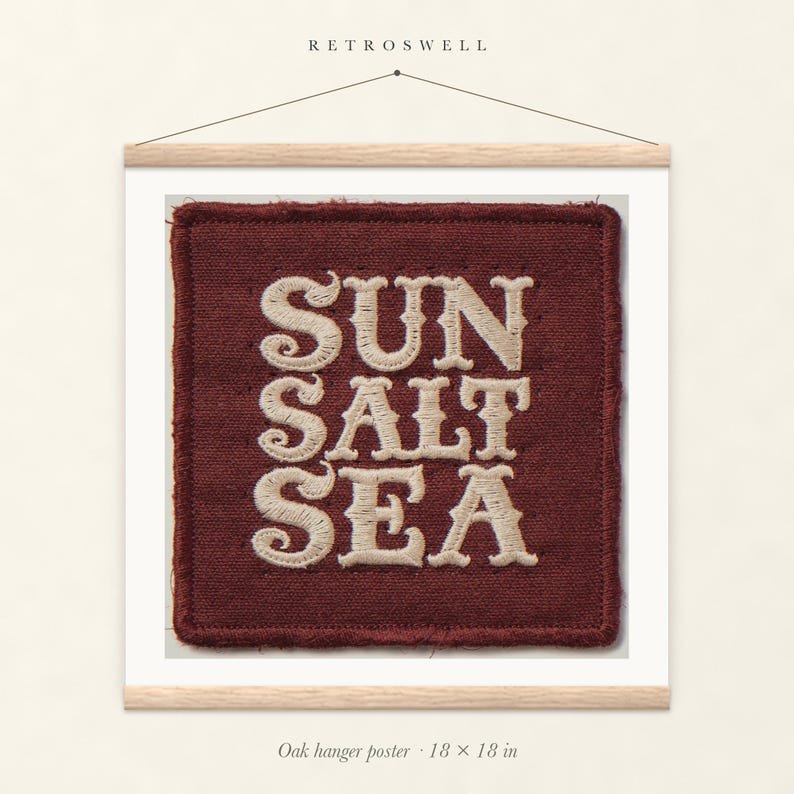 Sun Salt Sea Patch oak hanger poster, 18 by 18 inches, with natural wood rails and a hanging cord.