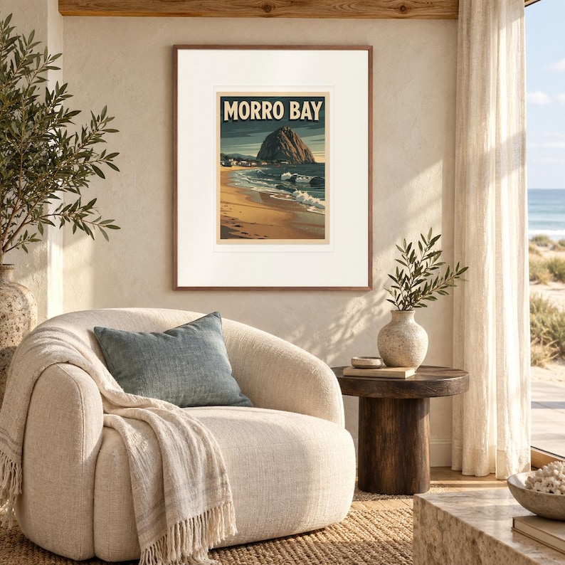 Morro Bay Surf print in a Red Oak frame with a white mat in a light-filled coastal sitting room.