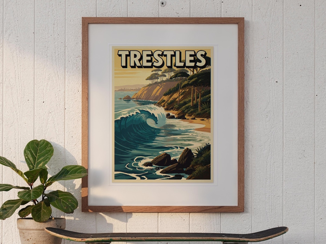 Trestles California Surf Travel Poster print in a Red Oak frame with a white mat, hanging above the console in a sunroom.