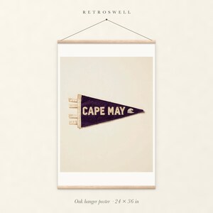 Cape May Surf Pennant oak hanger poster, 24 by 36 inches, with natural wood rails and a hanging cord.