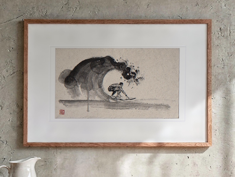 Surfer in the Barrel Xieyi Ink print in a Red Oak frame with a white mat, hanging above the sideboard in a dining room.