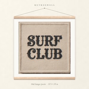 Surf Club Patch oak hanger poster, 18 by 18 inches, with natural wood rails and a hanging cord.