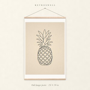 Pineapple Line oak hanger poster, 24 by 36 inches, with natural wood rails and a hanging cord.