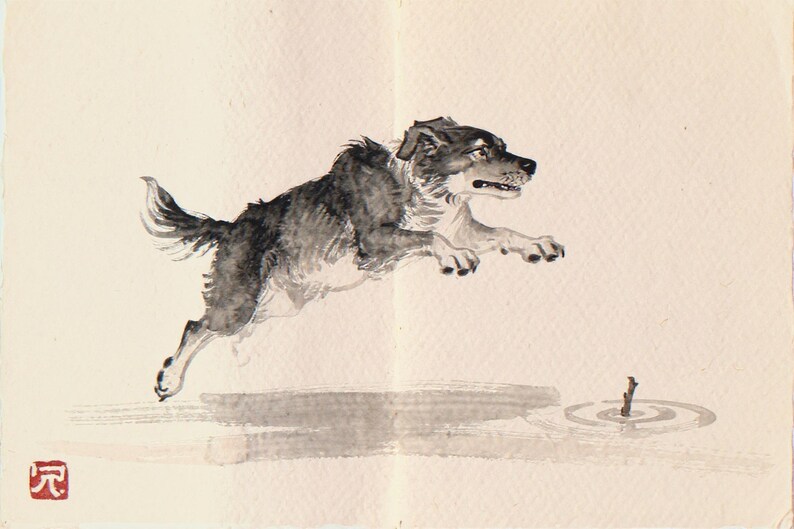 Xieyi Ink Dog Chasing Stick Into Surf Print framed in a beach-style living room setting