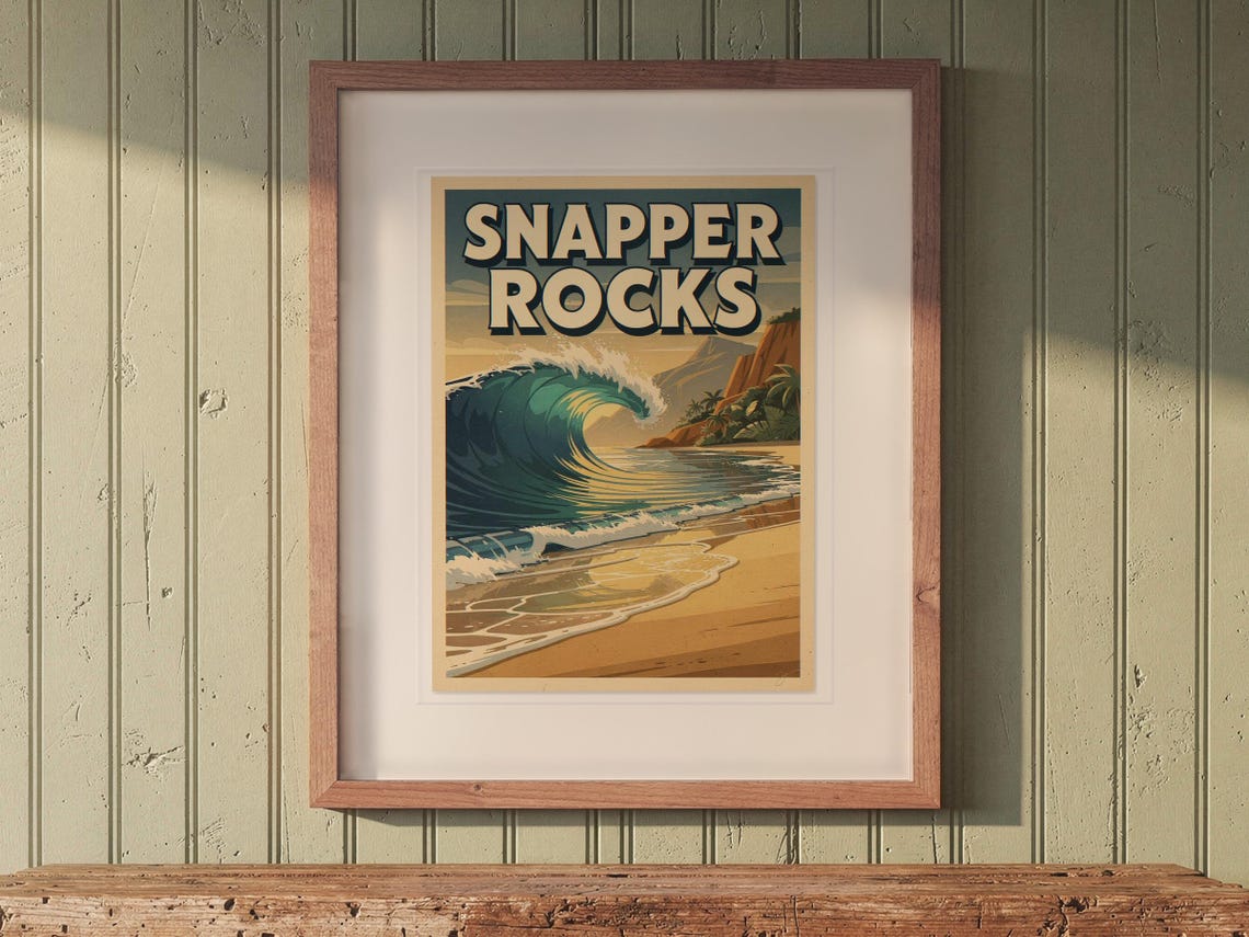 Snapper Rocks Surf Travel Poster print in a Red Oak frame with a white mat, hanging above the bench in a beach cottage entryway.