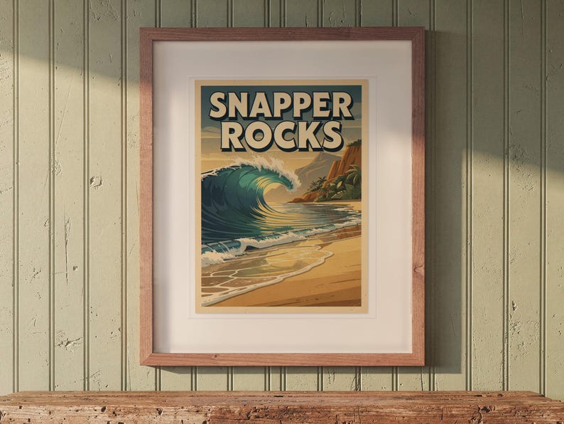 Snapper Rocks Surf Travel Poster print in a Red Oak frame with a white mat, hanging above the bench in a beach cottage entryway.