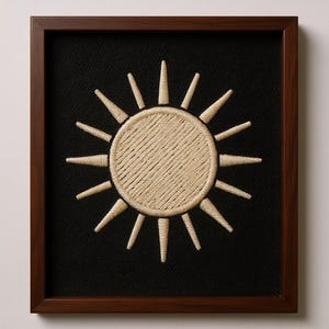 Sun Embroidered Patch Print framed in a home office setting