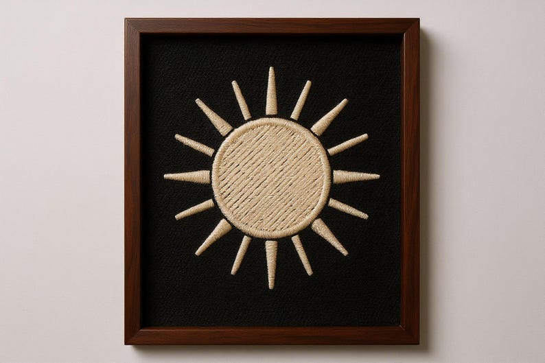 Sun Embroidered Patch Print framed in a home office setting