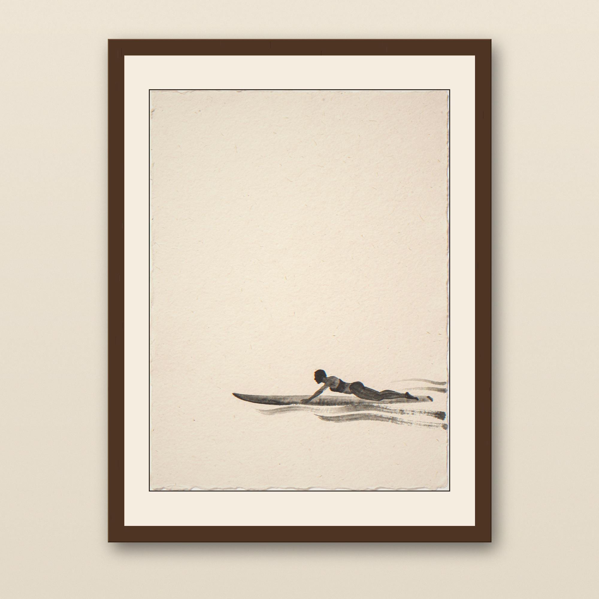 Sumi-e Lone Surfer Print - walnut framed art print with cream mat on plaster wall