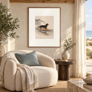 Bernese Mountain Dog Surfing print in a Red Oak frame with a white mat in a light-filled coastal sitting room.
