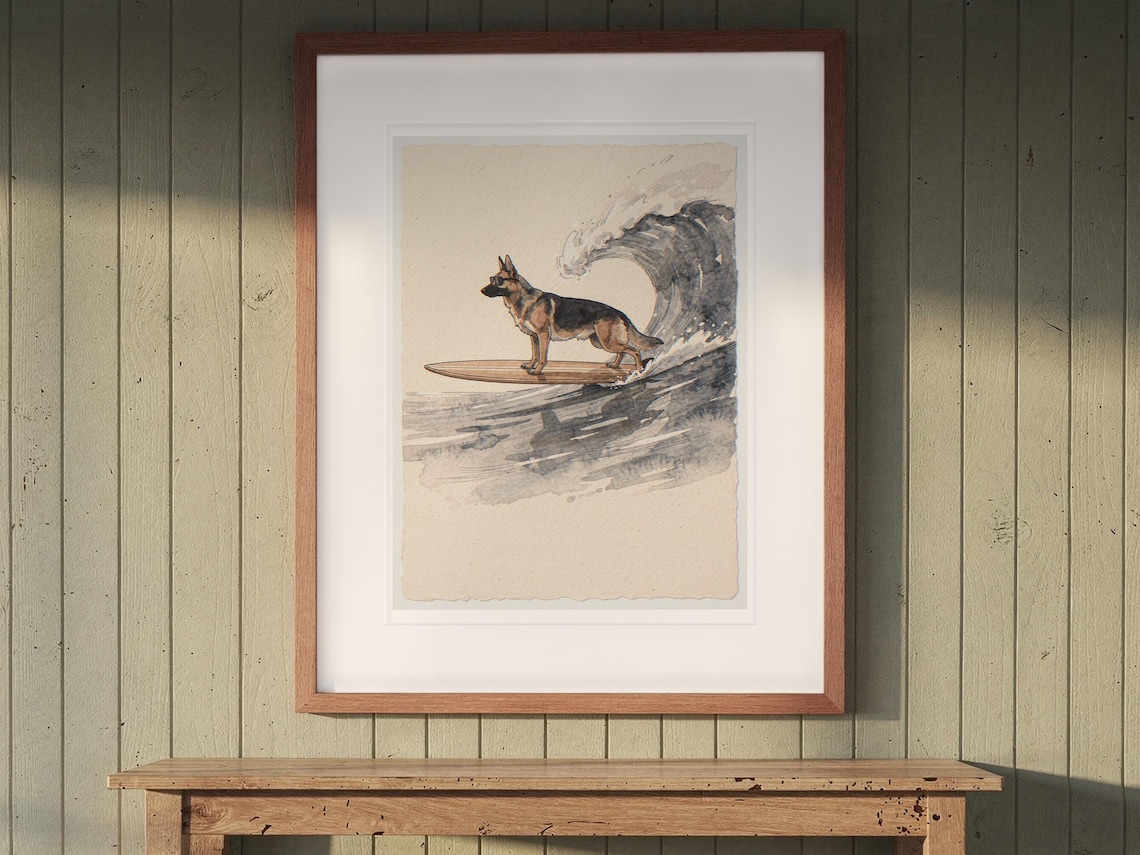 German Shepherd Surfing print in a Red Oak frame with a white mat, hanging above the console in a beach cottage entryway.