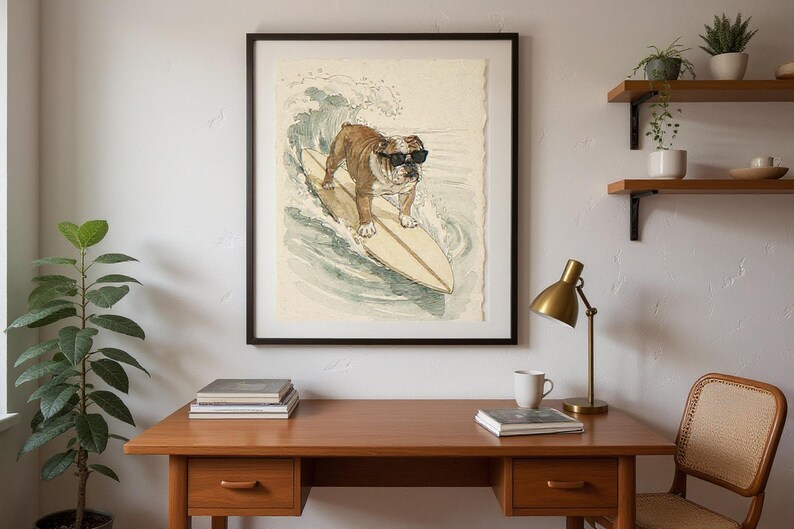 Bulldog Surfing Print framed in a home office setting
