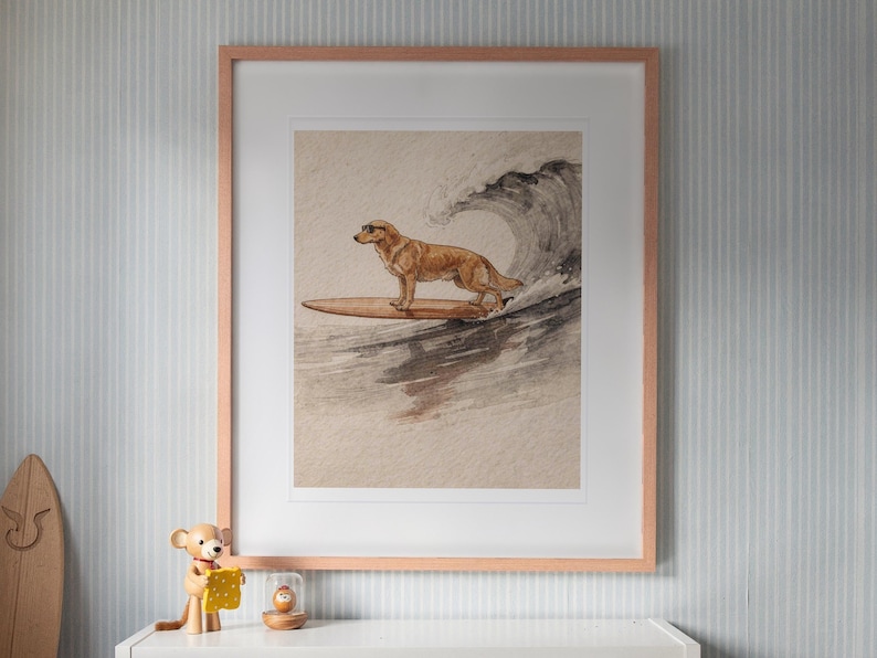 Golden Retriever Surfing print in a Red Oak frame with a white mat, hanging above the bookshelf in a kids' room.