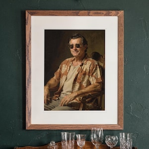 James Monroe Surfer print in a Red Oak frame with a white mat, hanging above the cabinet in a game room.