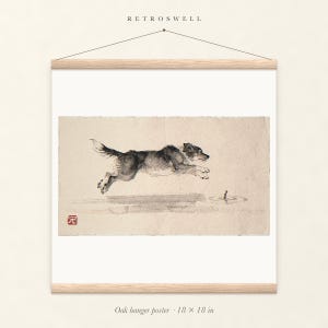 Dog Chasing a Stick Xieyi Ink oak hanger poster, 18 by 18 inches, the painting centred on the paper with natural wood rails and a hanging cord.