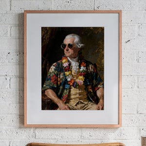 John Adams print in a Red Oak frame with a white mat, hanging above the desk in a home office.