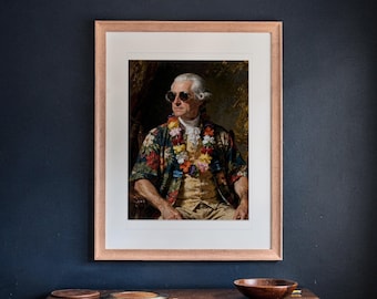 May include: A framed portrait print featuring a historical figure wearing a floral print shirt, a colourful lei, and dark sunglasses. The artwork is encased in a light-coloured wooden frame with a white mat, displayed against a dark wall.
