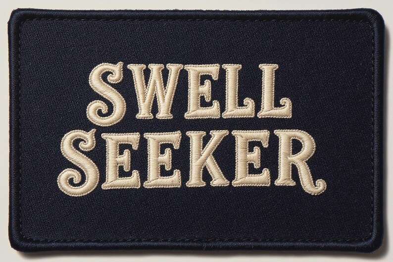 Swell Seeker Embroidered Patch Print framed in a coastal dining room setting