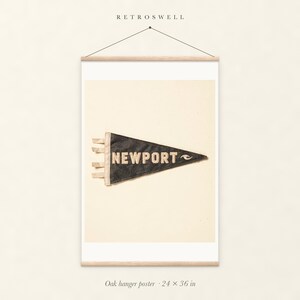 Newport, Rhode Island Surf Pennant oak hanger poster, 24 by 36 inches, with natural wood rails and a hanging cord.