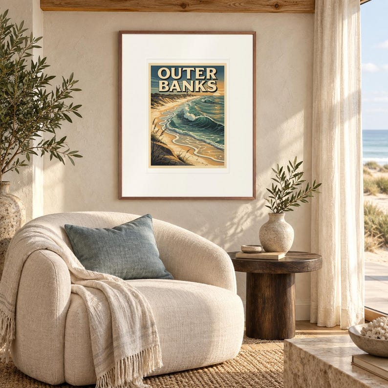Outer Banks Surf print in a Red Oak frame with a white mat in a light-filled coastal sitting room.