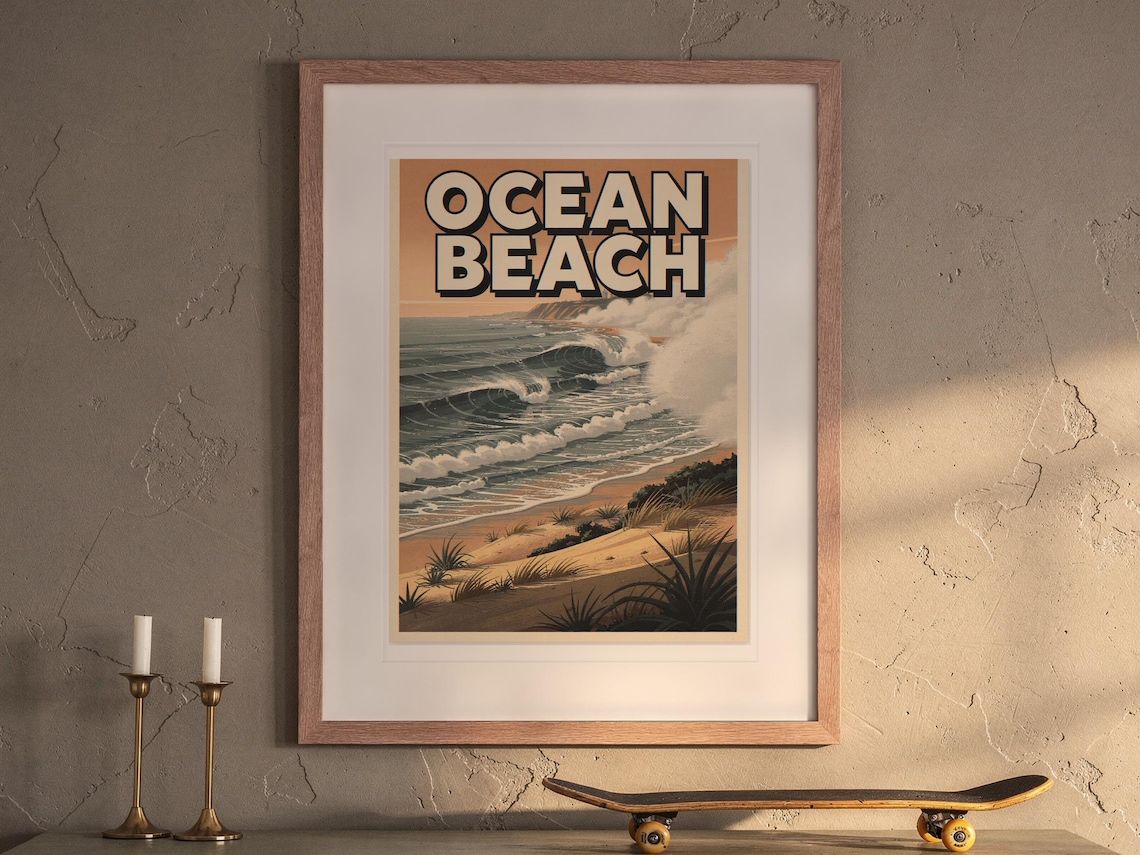 Ocean Beach San Diego Surf Travel Poster print in a Red Oak frame with a white mat, hanging above the buffet in a dining room.