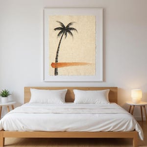 Sumi-e Lone Palm with Sunset Accent Print framed in a modern bedroom setting