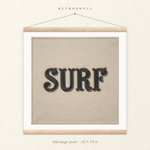 Surf Patch oak hanger poster, 18 by 18 inches, with natural wood rails and a hanging cord.