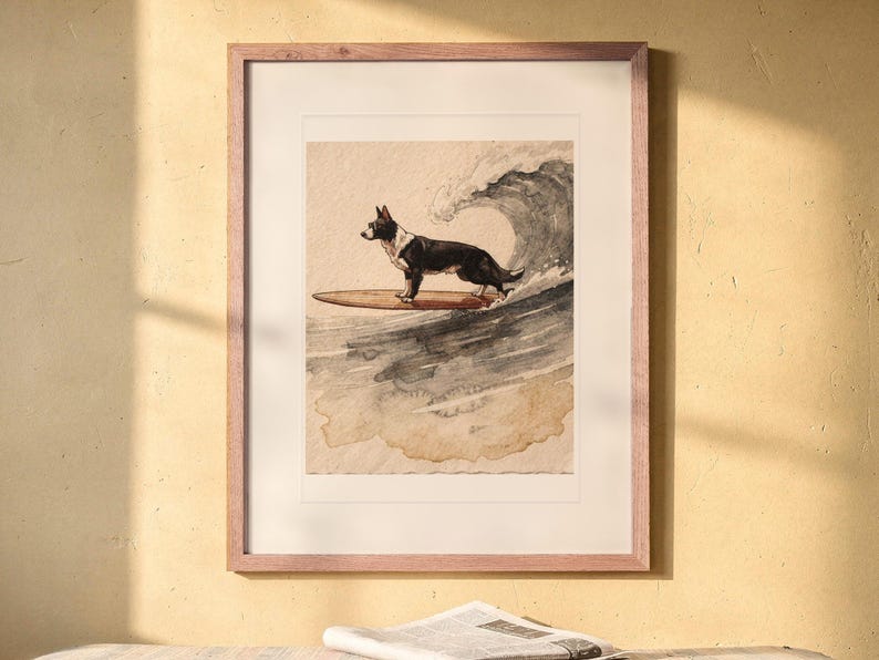 Black and White Surfing Dog print in a Red Oak frame with a white mat, hanging above the bench in a breakfast nook.