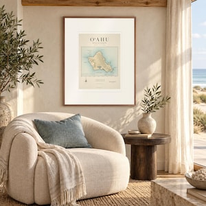 Oʻahu Surf Map print in a Red Oak frame with a white mat in a light-filled coastal sitting room.