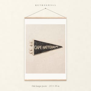 Cape Hatteras, North Carolina Surf Pennant oak hanger poster, 24 by 36 inches, with natural wood rails and a hanging cord.