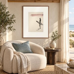 Surfer Ink Style print in a Red Oak frame with a white mat in a light-filled coastal sitting room.