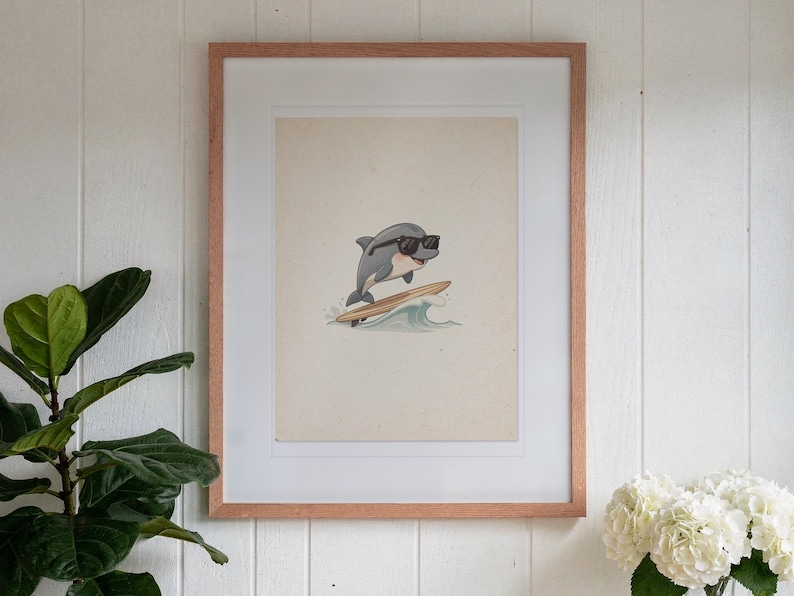 Dolphin Surfing print in a Red Oak frame with a white mat, hanging above the console in a sunroom.
