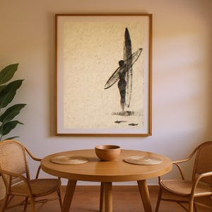 Sumi-e Dawn Patrol Surfer Print framed in a coastal dining room setting