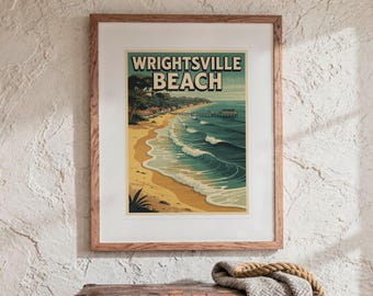 May include: A framed art print featuring a stylised illustration of Wrightsville Beach with sandy shores, rolling blue ocean waves, and a wooden pier. The text WRIGHTSVILLE BEACH is printed in bold, dark letters at the top of the artwork.