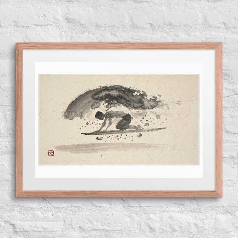 Surfer Duck Dive Xieyi Ink print in a Red Oak 24 by 18 inch frame with a white mat on a white brick wall.