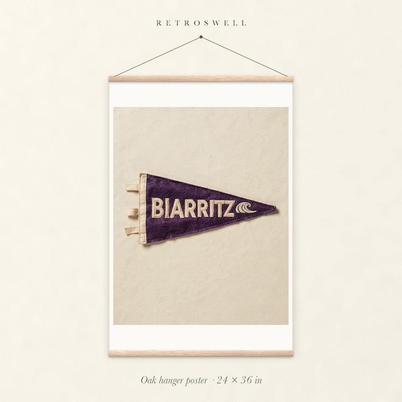 Biarritz, France Surf Pennant oak hanger poster, 24 by 36 inches, with natural wood rails and a hanging cord.