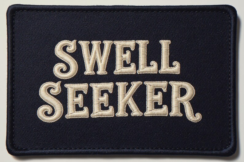 Swell Seeker Embroidered Patch Print framed in a home office setting