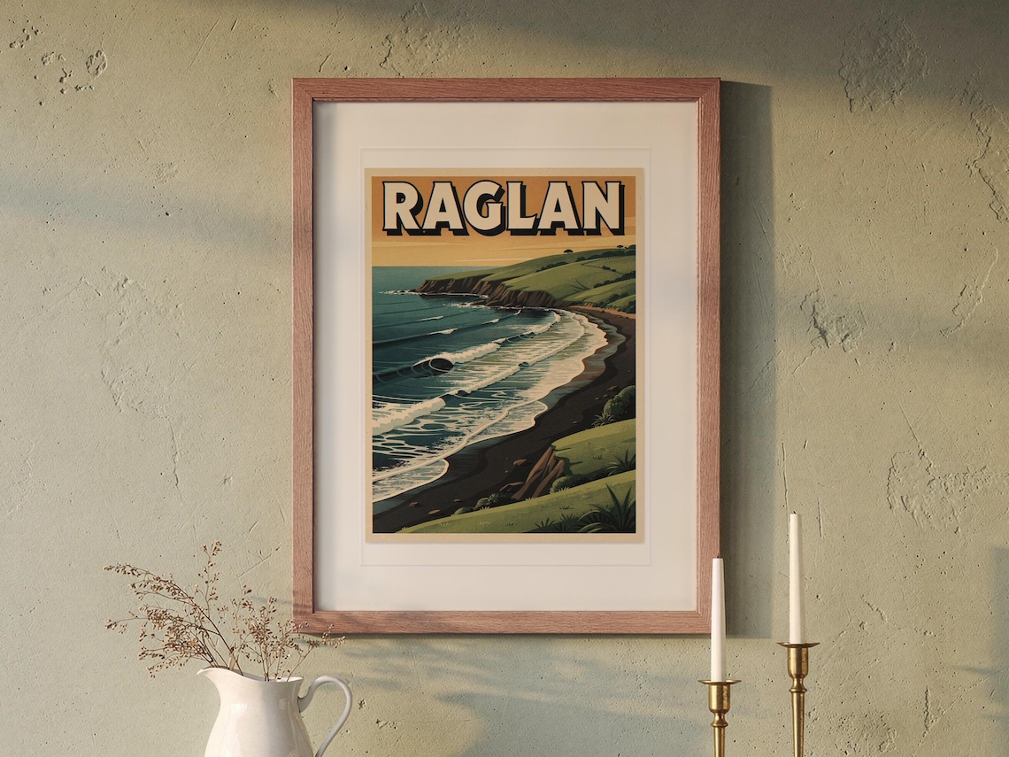 Raglan New Zealand Surf Travel Poster print in a Red Oak frame with a white mat, hanging above the buffet in a dining room.