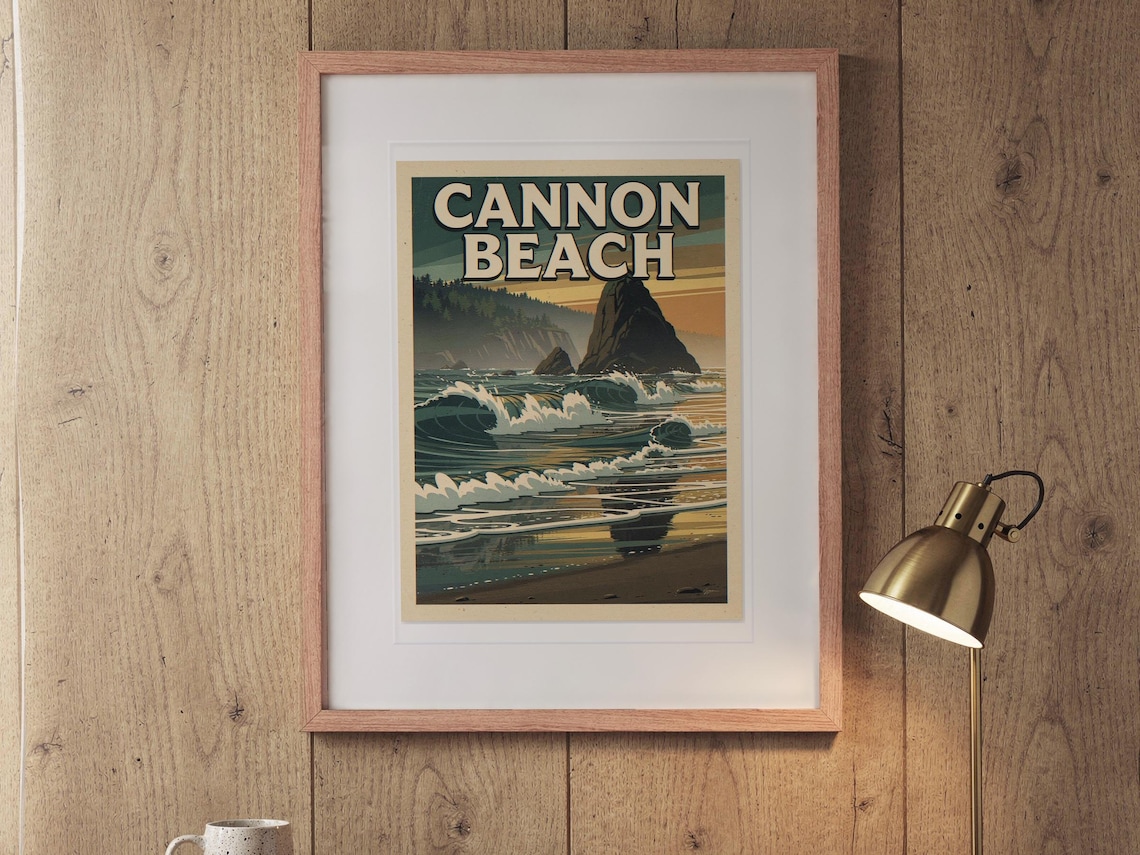 Cannon Beach Oregon Surf Travel Poster print in a Red Oak frame with a white mat, hanging above the desk in a home office.
