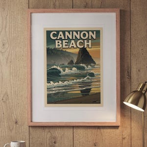 Cannon Beach Oregon Surf Travel Poster print in a Red Oak frame with a white mat, hanging above the desk in a home office.