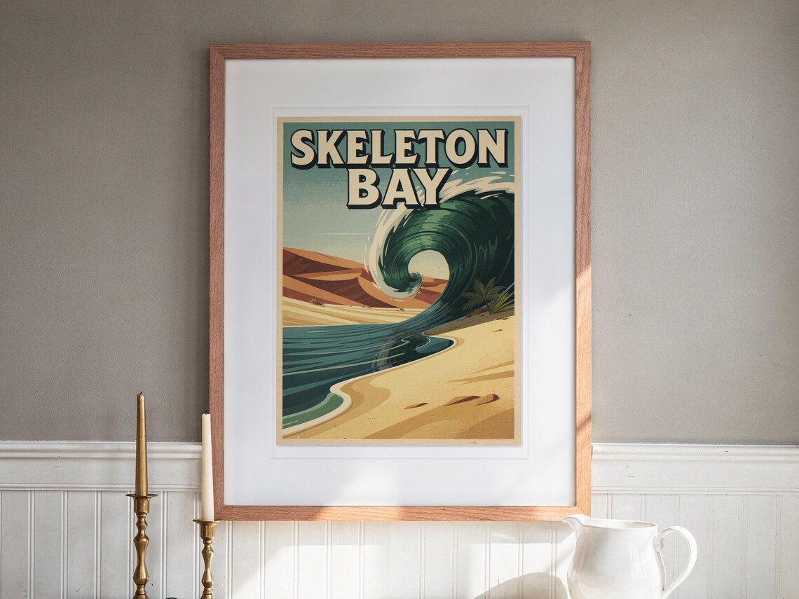 Skeleton Bay Namibia Surf Travel Poster print in a Red Oak frame with a white mat, hanging above the buffet in a dining room.