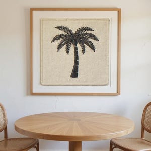 Palm Tree Embroidered Patch Print framed in a coastal dining room setting