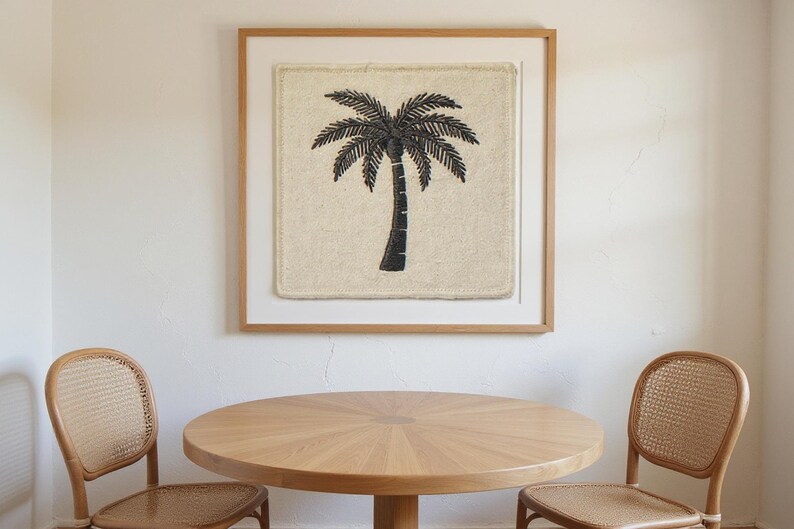 Palm Tree Embroidered Patch Print framed in a coastal dining room setting