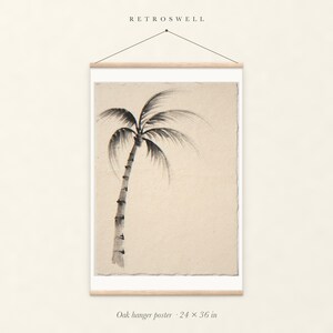 Lone Palm Tree Ink Style oak hanger poster, 24 by 36 inches, with natural wood rails and a hanging cord.
