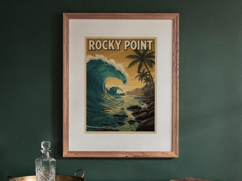 Rocky Point Surf Travel Poster print in a Red Oak frame with a white mat, hanging above the sideboard in a green study.