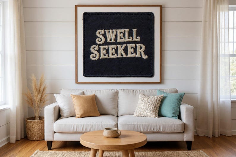 Swell Seeker Embroidered Patch Print framed in a beach-style living room setting