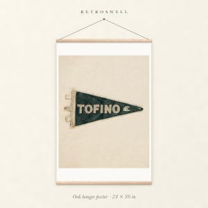Tofino Surf Pennant oak hanger poster, 24 by 36 inches, with natural wood rails and a hanging cord.