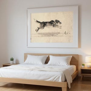 Xieyi Ink Dog Chasing Stick Into Surf Print framed in a modern bedroom setting